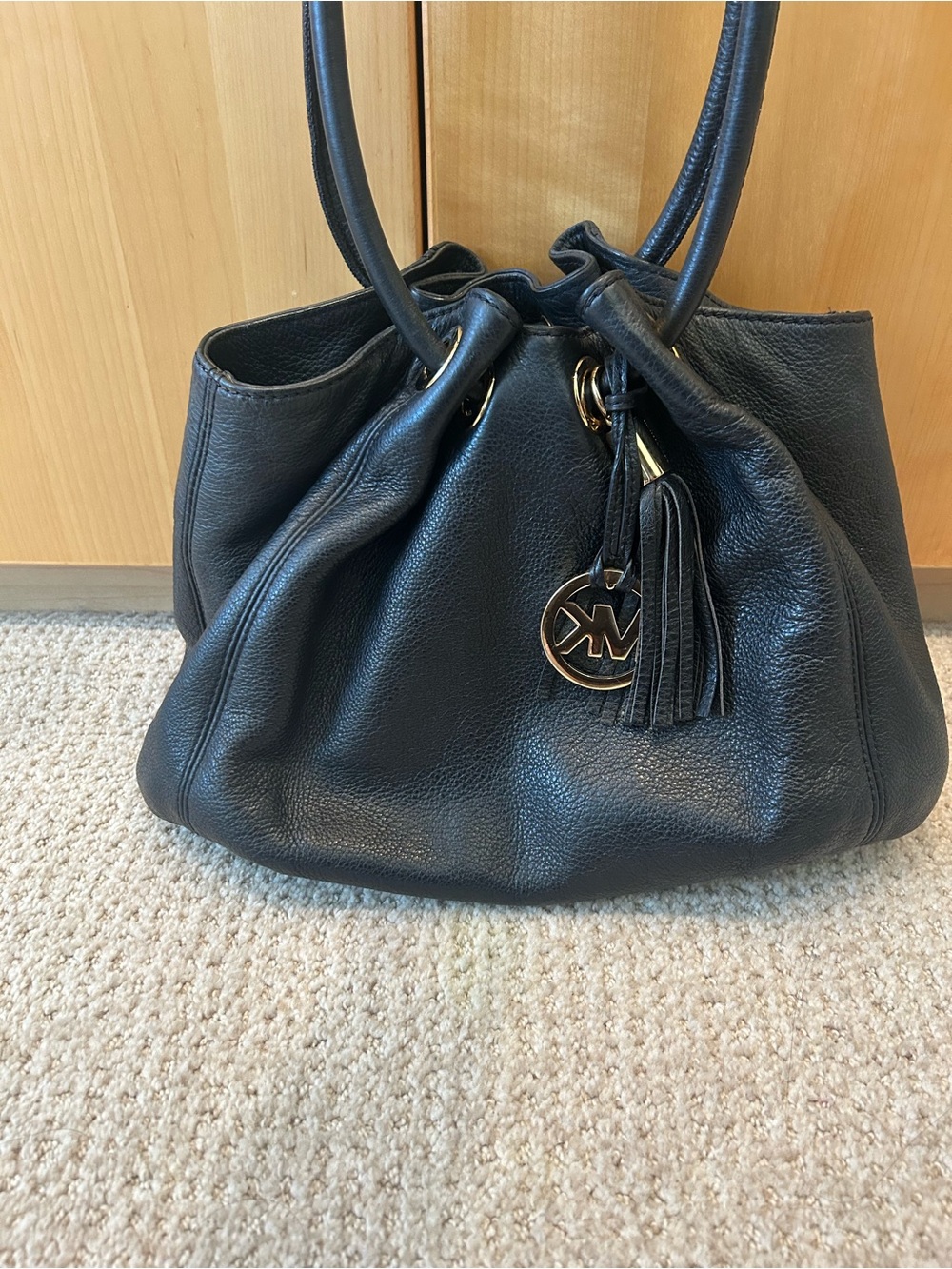 Michael Kors Black Pebbled Leather Drawstring Shoulder Bag with Tassel Charm